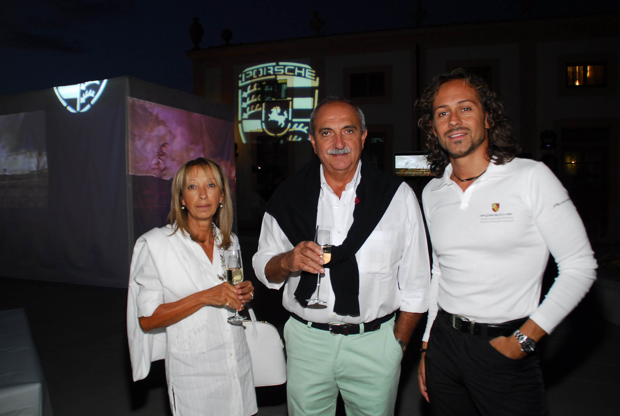 PRESSPHOTO  Firenze, Resort Villa Olmi, presentazione Porsche Panamera. Nella foto Simone Pecchioli, Franco Cortesi e Gianna Salocchi